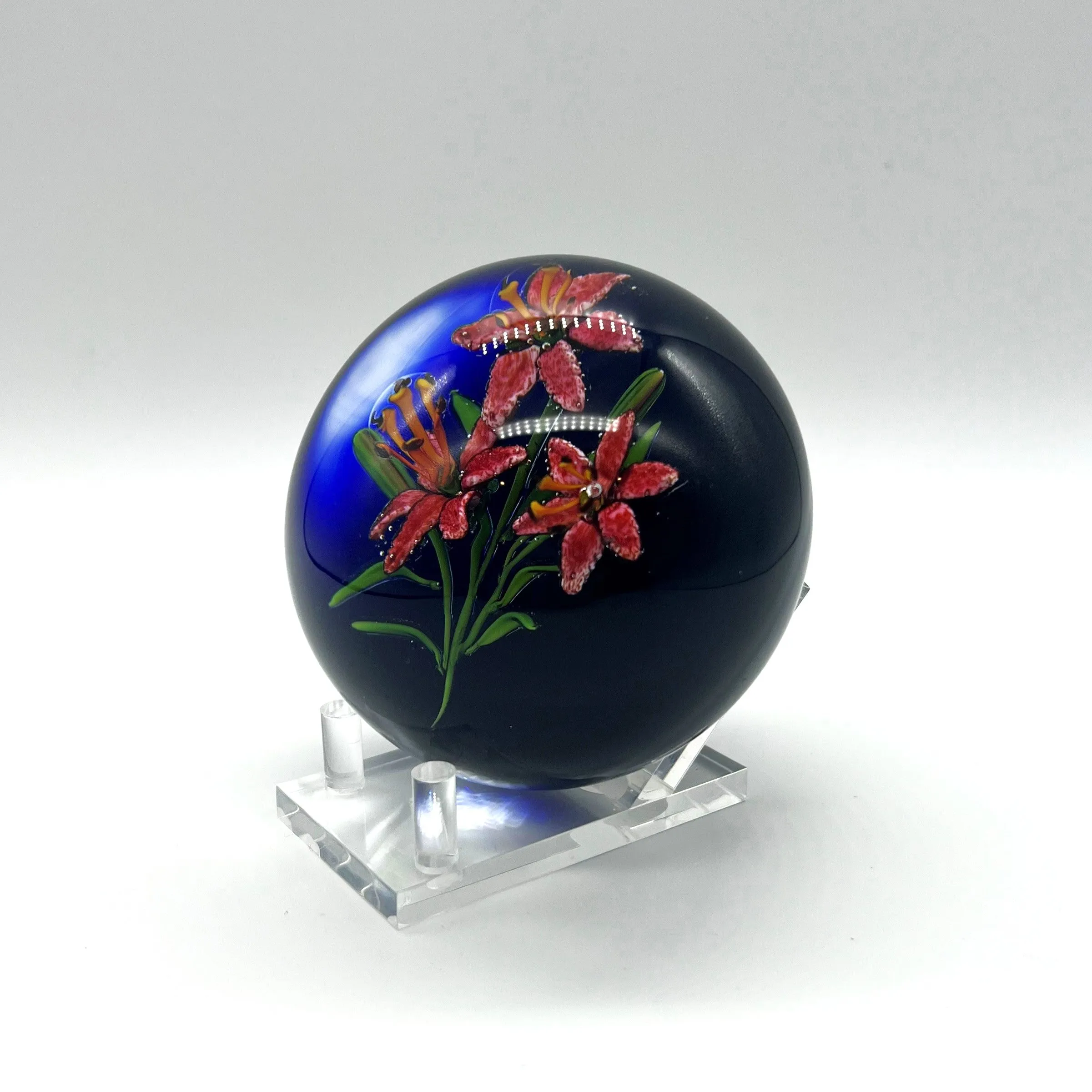 Lilies on Dark Background Paperweight by Ken Rosenfeld